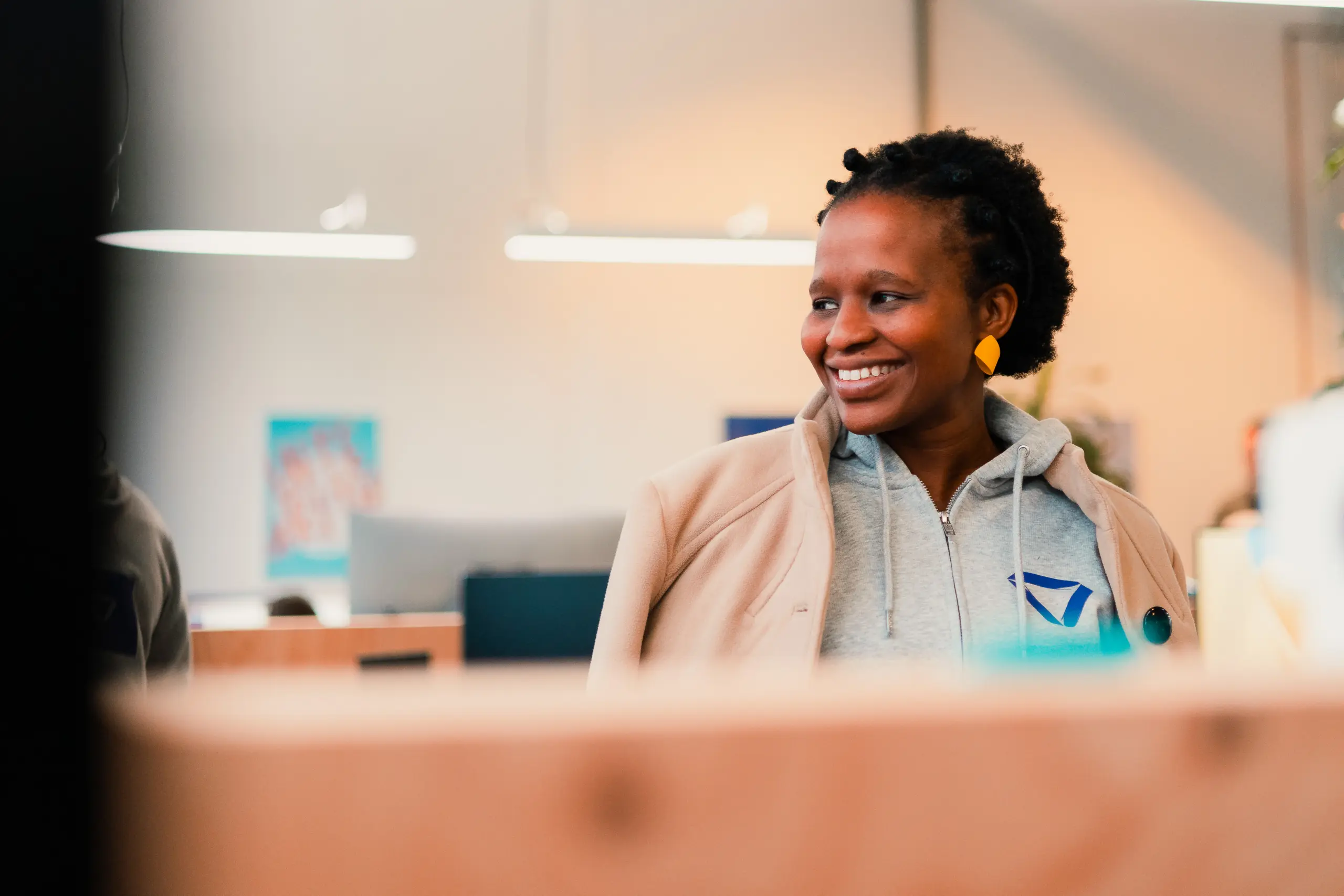 African colleague Sitting in Voys office