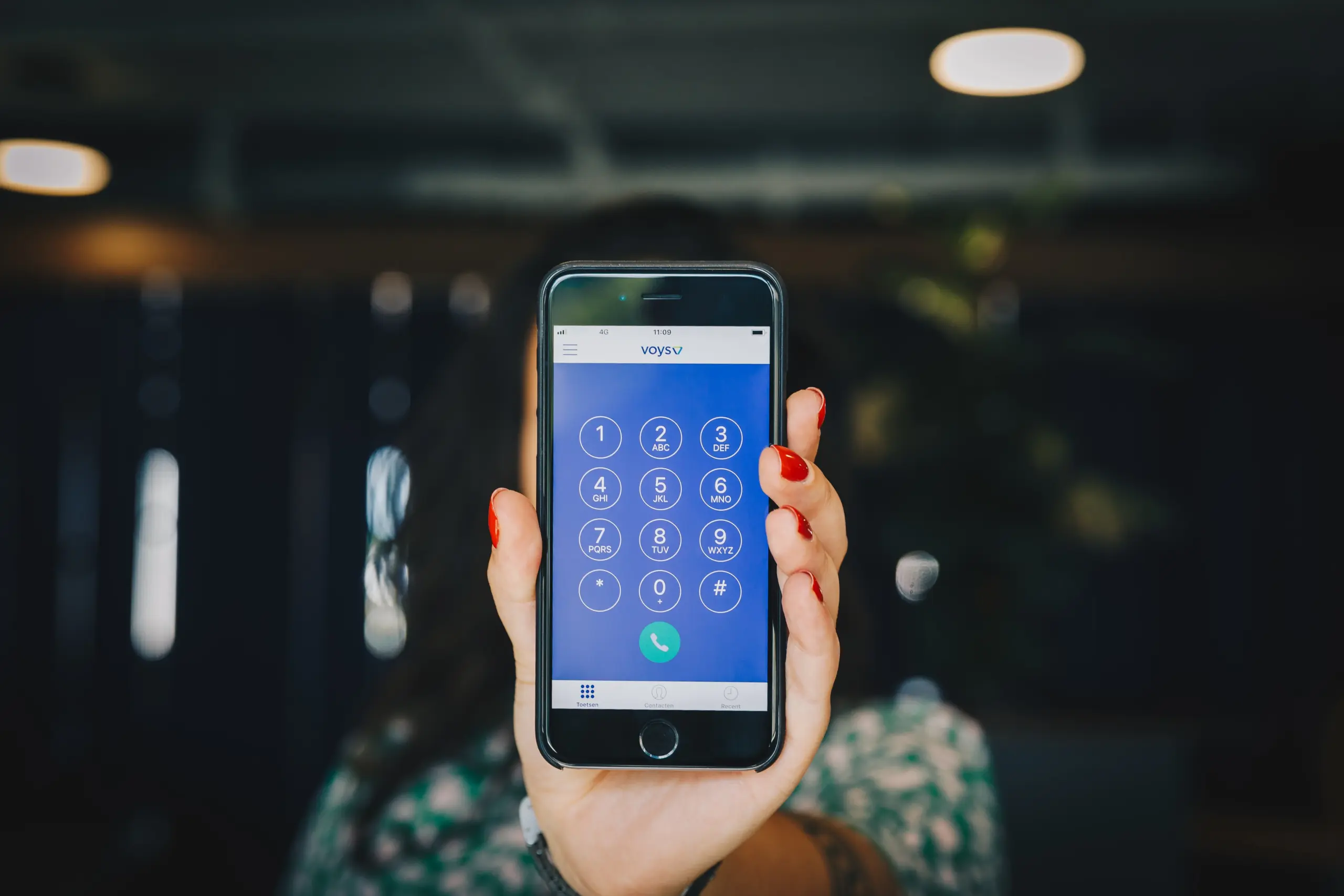 Voys colleague holding a cellphone