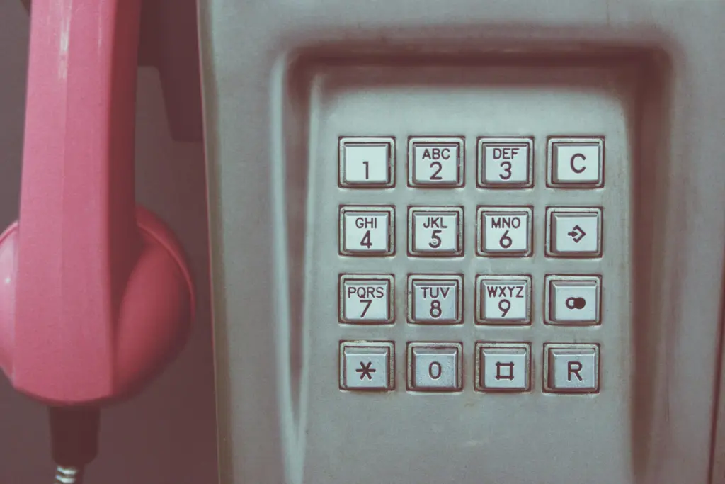 80s telephone bolted to the wall